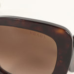 Prada Baroque Swirl Round Glasses