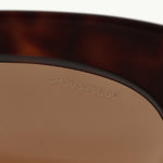 Prada Baroque Swirl Round Glasses